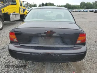 2000 Saturn SL z VIN 1G8ZH528XYZ160128, wystawiony jako Copart lot #64913404 z przebiegiem 172 587 mil mil oraz Czysty tytuł • Clean title. Historia ofert i sprzedaży dostępna na DreamBid. Obrazek 6.