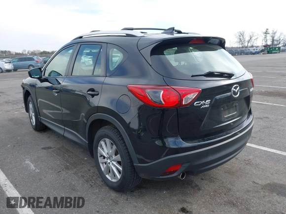 2016 Mazda CX-5 Sport with VIN JM3KE4BY7G0893578, listed as a IAAI auction lot 41853840 with 95,937 mi miles. Bid and sale history available at carsss.com. Image 3.