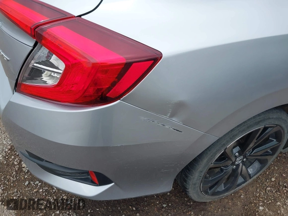 2021 Honda Civic Sport with VIN 2HGFC2F83MH510243, listed as a IAAI auction lot 41856857 with 95,739 mi miles and . Bid and sale history available at DreamBid. Image 6.