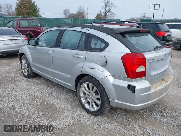 2011 Dodge Caliber Heat with VIN 1B3CB5HA0BD237473, listed as a IAAI auction lot 41690622 with 205,961 mi miles and . Bid and sale history available at DreamBid. Image 3.