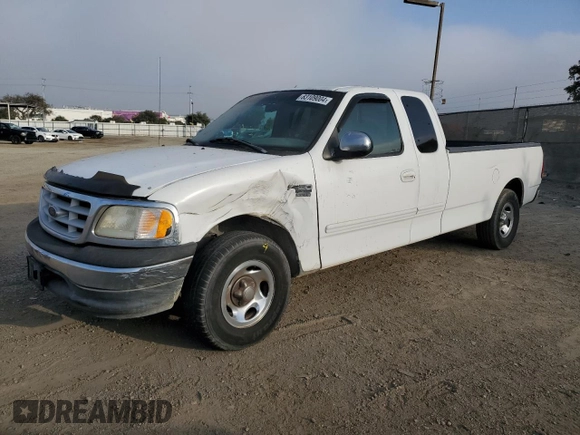 1999 Ford F-150 XL with VIN 1FTRX17L6XNA06844, listed as a Copart auction lot 83109004 with Not Provided miles and Salvage Title. Bid and sale history available at carsss.com. Image 1.