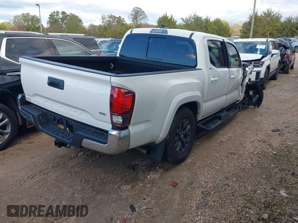 2023 Toyota Tacoma SR5 z VIN 3TYAZ5CN6PT039427, wystawiony jako IAAI lot #40866490 z przebiegiem 18 481 mil mil oraz . Historia ofert i sprzedaży dostępna na DreamBid. Obrazek 4.