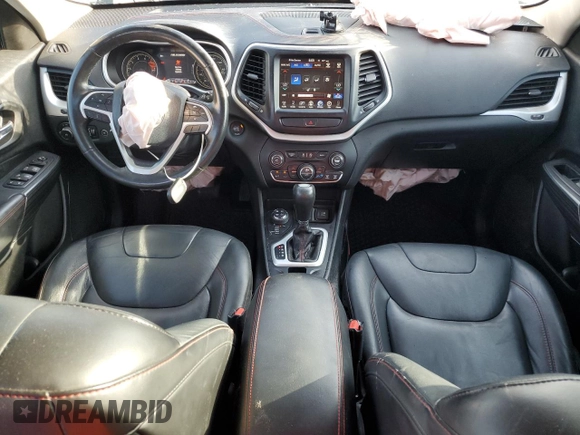 2016 Jeep Cherokee Trailhawk with VIN 1C4PJMBS4GW188840, listed as a Copart auction lot 58760605 with 117,570 mi miles and Salvage title. Bid and sale history available at DreamBid. Image 8.