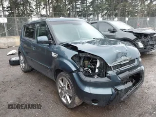 2011 Kia Soul + with VIN KNDJT2A2XB7279023, listed as a IAAI auction lot 41979158 with 178,573 mi miles. Bid and sale history available at carsss.com. Image 1.