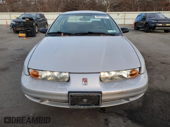 2001 Saturn SL z VIN 1G8ZK52761Z204012, wystawiony jako Copart lot #86618384 z przebiegiem 99 674 mil mil oraz Szkoda całkowita • Salvage title. Historia ofert i sprzedaży dostępna na DreamBid. Obrazek 5.