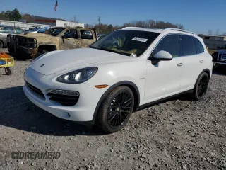 2012 Porsche Cayenne S Hybrid z VIN WP1AE2A2XCLA92544, wystawiony jako Copart lot #48896985 z przebiegiem 182 567 mil mil oraz Tytuł czysty. Historia ofert i sprzedaży dostępna na DreamBid. Obrazek 1.
