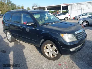 2009 Kia Borrego LX with VIN KNDJJ741295023955, listed as a IAAI auction lot 41605112 with 157,034 mi miles. Bid and sale history available at carsss.com. Image 1.
