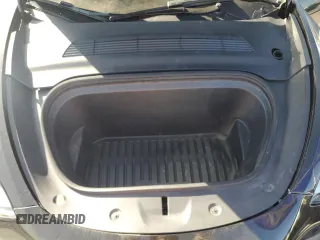 2024 Tesla Model Y Long Range с VIN 7SAYGDEE8RA231933, выставлен на аукционе Copart как лот 58078115 с пробегом 14 959 миль миль и Списание • Salvage title. История ставок и продаж доступна на DreamBid. Изображение 11.