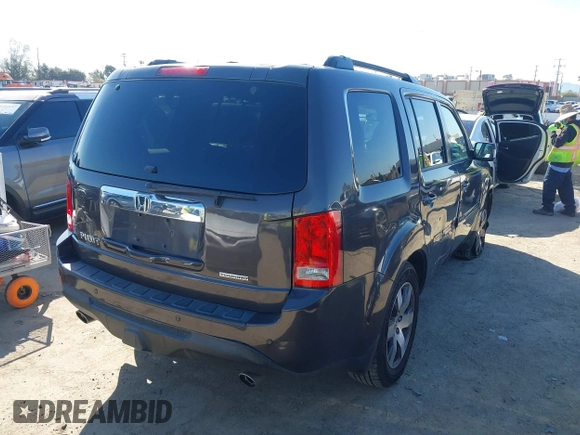 2015 Honda Pilot Touring with VIN 5FNYF3H94FB002236, listed as a IAAI auction lot 41735221 with 112,766 mi miles. Bid and sale history available at carsss.com. Image 4.