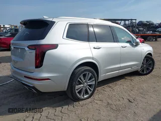 2020 Cadillac XT6 FWD Premium Luxury z VIN 1GYKPCRSXLZ136057, wystawiony jako IAAI lot #42211514 z przebiegiem 32 476 mil mil oraz . Historia ofert i sprzedaży dostępna na DreamBid. Obrazek 4.