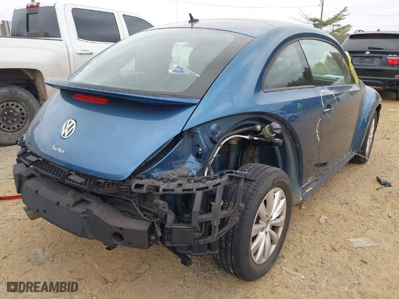 2019 Volkswagen Beetle S with VIN 3VWFD7AT8KM708865, listed as a IAAI auction lot 41692756 with 35,070 mi miles. Bid and sale history available at carsss.com. Image 4.