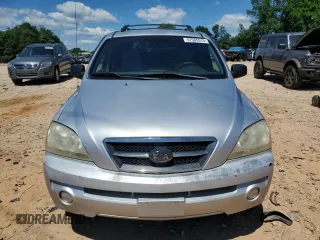 2005 Kia Sorento LX z VIN KNDJD733X55474717, wystawiony jako Copart lot #57565515 z przebiegiem 215 484 mil mil oraz Szkoda całkowita • Salvage title. Historia ofert i sprzedaży dostępna na DreamBid. Obrazek 5.
