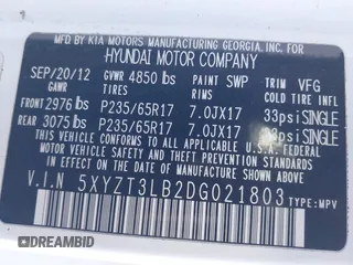 2013 Hyundai Santa Fe Sport z VIN 5XYZT3LB2DG021803, wystawiony jako IAAI lot #41195838 z przebiegiem Nie podano mil oraz . Historia ofert i sprzedaży dostępna na DreamBid. Obrazek 9.