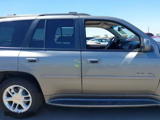 2008 GMC Envoy Denali with VIN 1GKET63M082201867, listed as a IAAI auction lot 41874803 with 218,639 mi miles. Bid and sale history available at carsss.com. Image 13.