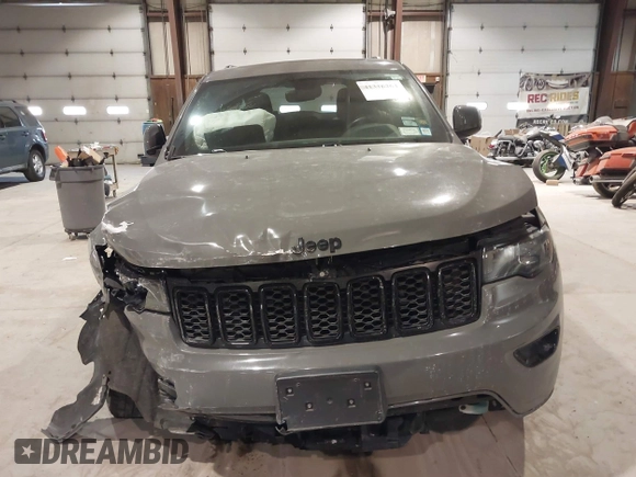 2019 Jeep Grand Cherokee Laredo E with VIN 1C4RJFAG9KC667394, listed as a IAAI auction lot 41316264 with 55,156 mi miles. Bid and sale history available at carsss.com. Image 12.