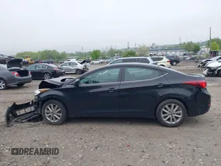 2015 Hyundai Elantra SE z VIN 5NPDH4AE5FH589344, wystawiony jako IAAI lot #42188682 z przebiegiem Nie podano mil oraz . Historia ofert i sprzedaży dostępna na DreamBid. Obrazek 14.