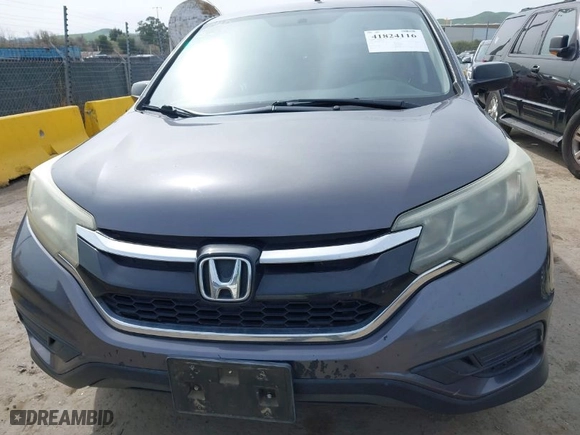 2015 Honda CR-V LX with VIN 3CZRM3H32FG702573, listed as a IAAI auction lot 41824116 with 266,847 mi miles. Bid and sale history available at carsss.com. Image 6.