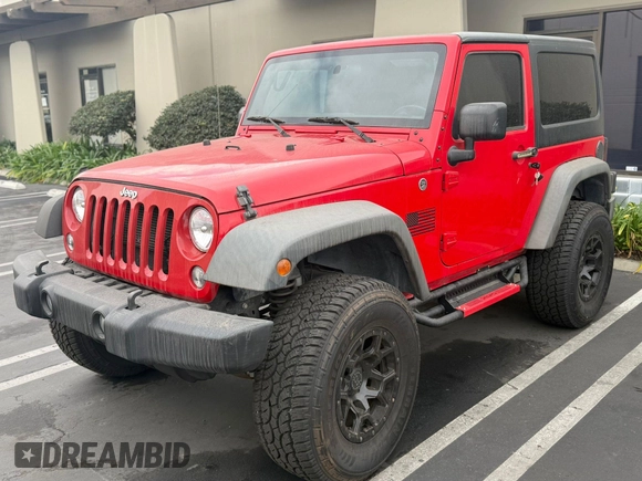 2015 Jeep Wrangler Sport with VIN 1C4AJWAG0FL750098, listed as a IAAI auction lot 41266454 with 77,115 mi miles. Bid and sale history available at carsss.com. Image 2.