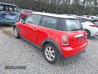 2010 MINI Hardtop with VIN WMWMF3C51ATZ65259, listed as a IAAI auction lot 42248896 with 106,216 mi miles and . Bid and sale history available at DreamBid. Image 3.
