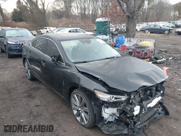 2019 Mazda 6 Grand Touring Reserve with VIN JM1GL1WY6K1505935, listed as a IAAI auction lot 41626078 with 19,000 mi miles and . Bid and sale history available at DreamBid. Image 12.