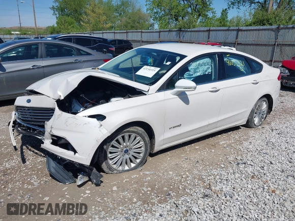 2013 Ford Fusion SE Hybrid z VIN 3FA6P0LU9DR349321, wystawiony jako IAAI lot #42156321 z przebiegiem 90 688 mil mil oraz . Historia ofert i sprzedaży dostępna na DreamBid. Obrazek 17.
