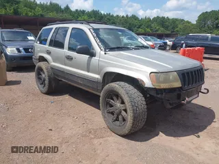 2004 Jeep Grand Cherokee Laredo with VIN 1J4GW48S34C354006, listed as a IAAI auction lot 42599812 with 258,004 mi miles and . Bid and sale history available at DreamBid. Image 1.