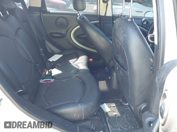 2012 MINI Countryman with VIN WMWZB3C50CWM03775, listed as a IAAI auction lot 41876928 with 151,366 mi miles and . Bid and sale history available at DreamBid. Image 8.