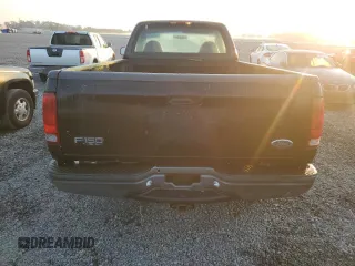2003 Ford F-150 XL with VIN 1FTRF17W13NA97772, listed as a Copart auction lot 77692074 with Not Provided miles and Salvage Title. Bid and sale history available at DreamBid. Image 6.