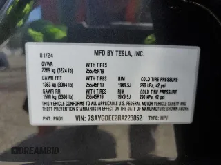 2024 Tesla Model Y Long Range z VIN 7SAYGDEE2RA223052, wystawiony jako Copart lot #61485025 z przebiegiem 13 268 mil mil oraz Szkoda całkowita • Salvage title. Historia ofert i sprzedaży dostępna na DreamBid. Obrazek 12.