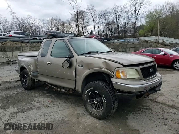 2002 Ford F-150 XL with VIN 1FTRX08L12KA41875, listed as a Copart auction lot 64756525 with 221,793 mi miles and Non repairable. Bid and sale history available at DreamBid. Image 10.