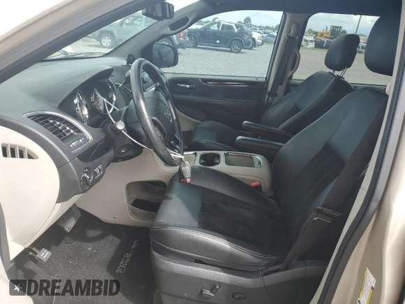 2014 Dodge Grand Caravan SXT 30th Anniversary with VIN 2C4RDGCG2ER328126, listed as a Copart auction lot 74277684 with Not Provided miles and Salvage Title. Bid and sale history available at DreamBid. Image 7.