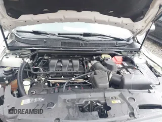2016 Ford Taurus SEL with VIN 1FAHP2E85GG103883, listed as a IAAI auction lot 42243173 with 119,334 mi miles and . Bid and sale history available at DreamBid. Image 10.