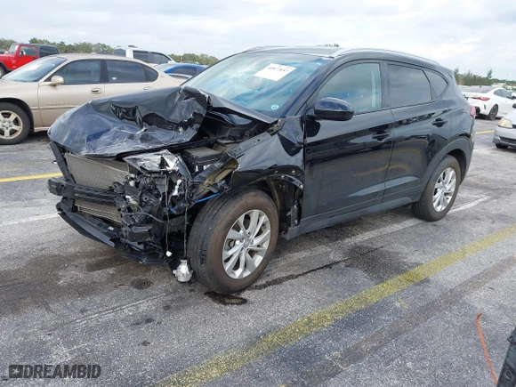 2019 Hyundai Tucson Value with VIN KM8J33A40KU068014, listed as a IAAI auction lot 40877057 with 34,966 mi miles. Bid and sale history available at carsss.com. Image 17.