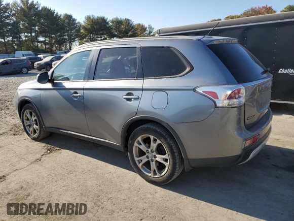 2015 Mitsubishi Outlander SE with VIN JA4AZ3A32FZ007146, listed as a Copart auction lot 76704484 with 159,839 mi miles and Salvage title. Bid and sale history available at DreamBid. Image 2.