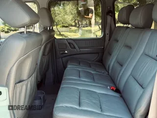 2002 Mercedes-Benz G 500 with VIN WDCYR49EX2X128555, listed as a Copart auction lot 55605995 with 225,042 mi miles and Salvage Title. Bid and sale history available at DreamBid. Image 6.