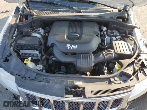 2013 Jeep Grand Cherokee Overland with VIN 1C4RJFCG8DC639408, listed as a Copart auction lot 77910444 with 89,623 mi miles and Salvage Title. Bid and sale history available at carsss.com. Image 12.