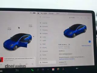 2019 Tesla Model 3 Long Range with VIN 5YJ3E1EB9KF454007, listed as a IAAI auction lot 41769346 with 141,609 mi miles. Bid and sale history available at carsss.com. Image 7.