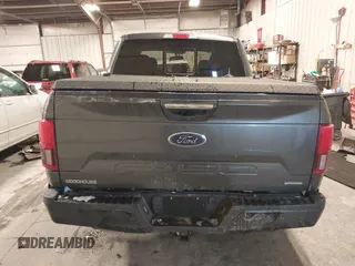 2020 Ford F-150 XL with VIN 1FTEW1E46LFC05572, listed as a IAAI auction lot 41611304 with 150,106 mi miles and . Bid and sale history available at DreamBid. Image 16.
