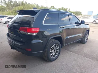 2014 Jeep Grand Cherokee Limited with VIN 1C4RJEBG5EC364240, listed as a IAAI auction lot 42127311 with 176,779 mi miles and . Bid and sale history available at DreamBid. Image 4.