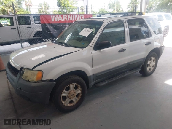 2004 Ford Escape XLT z VIN 1FMYU03184DA08689, wystawiony jako IAAI lot #42538780 z przebiegiem 251 930 mil mil oraz . Historia ofert i sprzedaży dostępna na DreamBid. Obrazek 18.