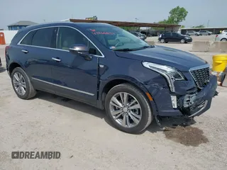 2024 Cadillac XT5 FWD Premium Luxury with VIN 1GYKNCR41RZ738779, listed as a IAAI auction lot 42266837 with 3,166 mi miles and . Bid and sale history available at DreamBid. Image 1.
