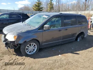 2018 Dodge Grand Caravan SXT z VIN 2C4RDGCG4JR359968, wystawiony jako Copart lot #50257915 z przebiegiem 123 459 mil mil oraz Czysty tytuł • Clean title. Historia ofert i sprzedaży dostępna na DreamBid. Obrazek 1.