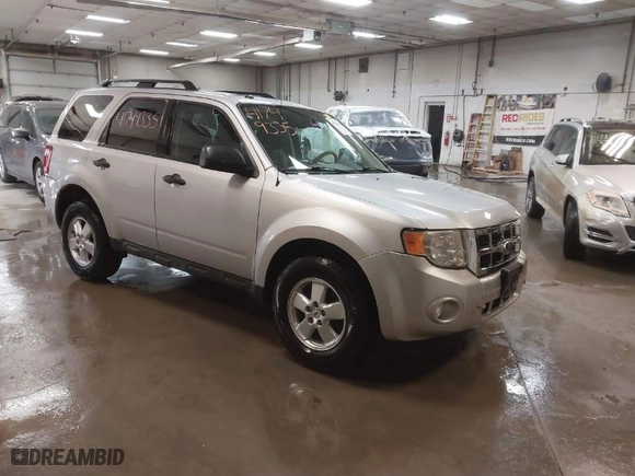 2010 Ford Escape XLT with VIN 1FMCU0DG5AKB02811, listed as a IAAI auction lot 41749335 with 103,071 mi miles. Bid and sale history available at carsss.com. Image 1.