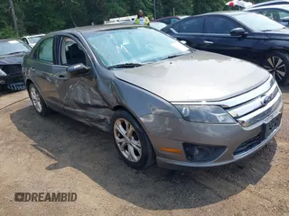 2012 Ford Fusion SE with VIN 3FAHP0HAXCR390109, listed as a IAAI auction lot 42470688 with 105,837 mi miles and . Bid and sale history available at DreamBid. Image 1.