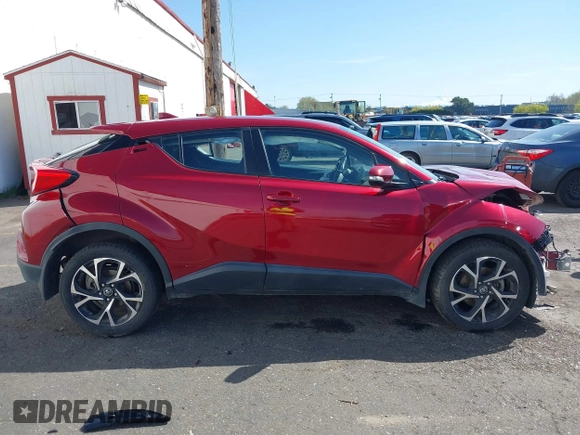 2018 Toyota C-HR XLE z VIN NMTKHMBX9JR023325, wystawiony jako IAAI lot #41926223 z przebiegiem 62 580 mil mil oraz . Historia ofert i sprzedaży dostępna na DreamBid. Obrazek 14.