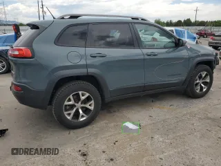 2015 Jeep Cherokee Trailhawk с VIN 1C4PJMBSXFW555223, выставлен на аукционе Copart как лот 62072235 с пробегом 207 240 миль миль и На запчасти • Non repairable. История ставок и продаж доступна на DreamBid. Изображение 3.