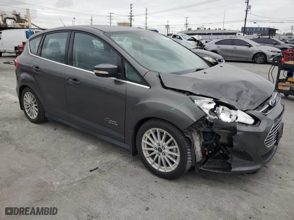 2015 Ford C-Max Energi SEL with VIN 1FADP5CUXFL121897, listed as a Copart auction lot 53493675 with 73,448 mi miles and Salvage Title. Bid and sale history available at carsss.com. Image 4.