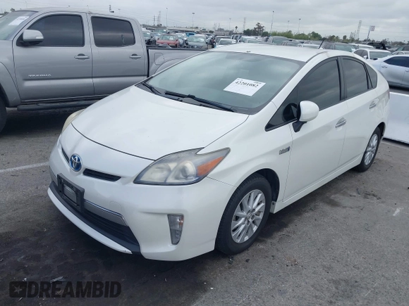 2012 Toyota Prius with VIN JTDKN3DP4C3027174, listed as a IAAI auction lot 42201082 with 147,827 mi miles and . Bid and sale history available at DreamBid. Image 2.