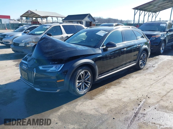 2019 Audi A4 allroad Premium Plus z VIN WA18NAF42KA009729, wystawiony jako IAAI lot #41698959 z przebiegiem 60 893 mil mil oraz . Historia ofert i sprzedaży dostępna na DreamBid. Obrazek 19.