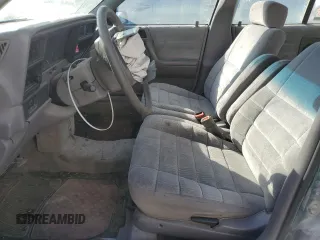 1995 Plymouth Acclaim z VIN 3P3AA4639ST552970, wystawiony jako Copart lot #76737854 z przebiegiem 113 119 mil mil oraz Szkody całkowita. Historia ofert i sprzedaży dostępna na DreamBid. Obrazek 7.